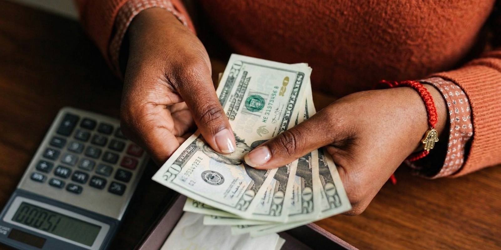 A woman counting money