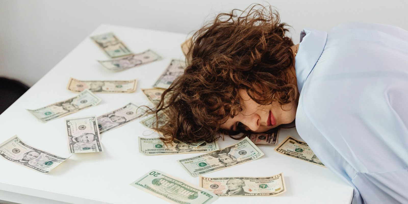 A woman is worried about money.