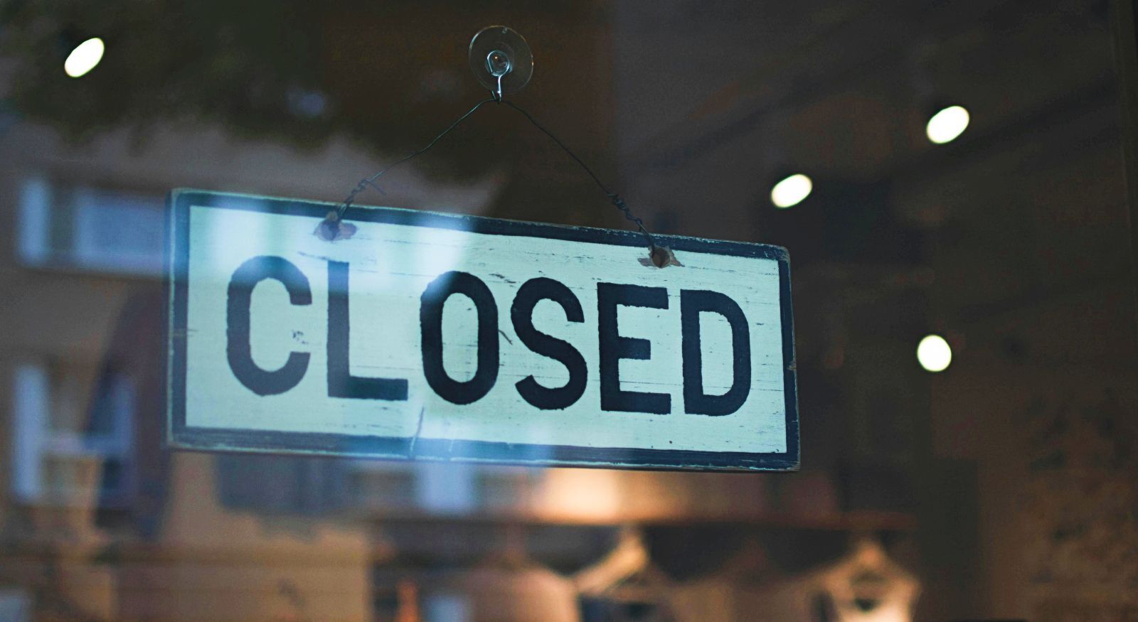 A closed sign in a store.