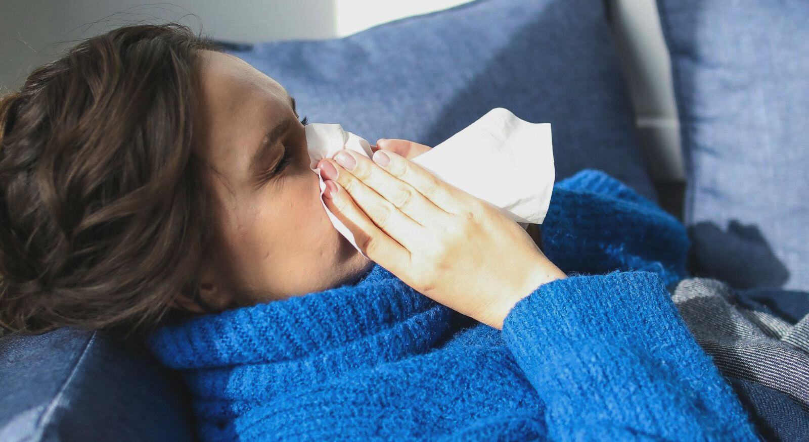 A woman with allergy symptoms.