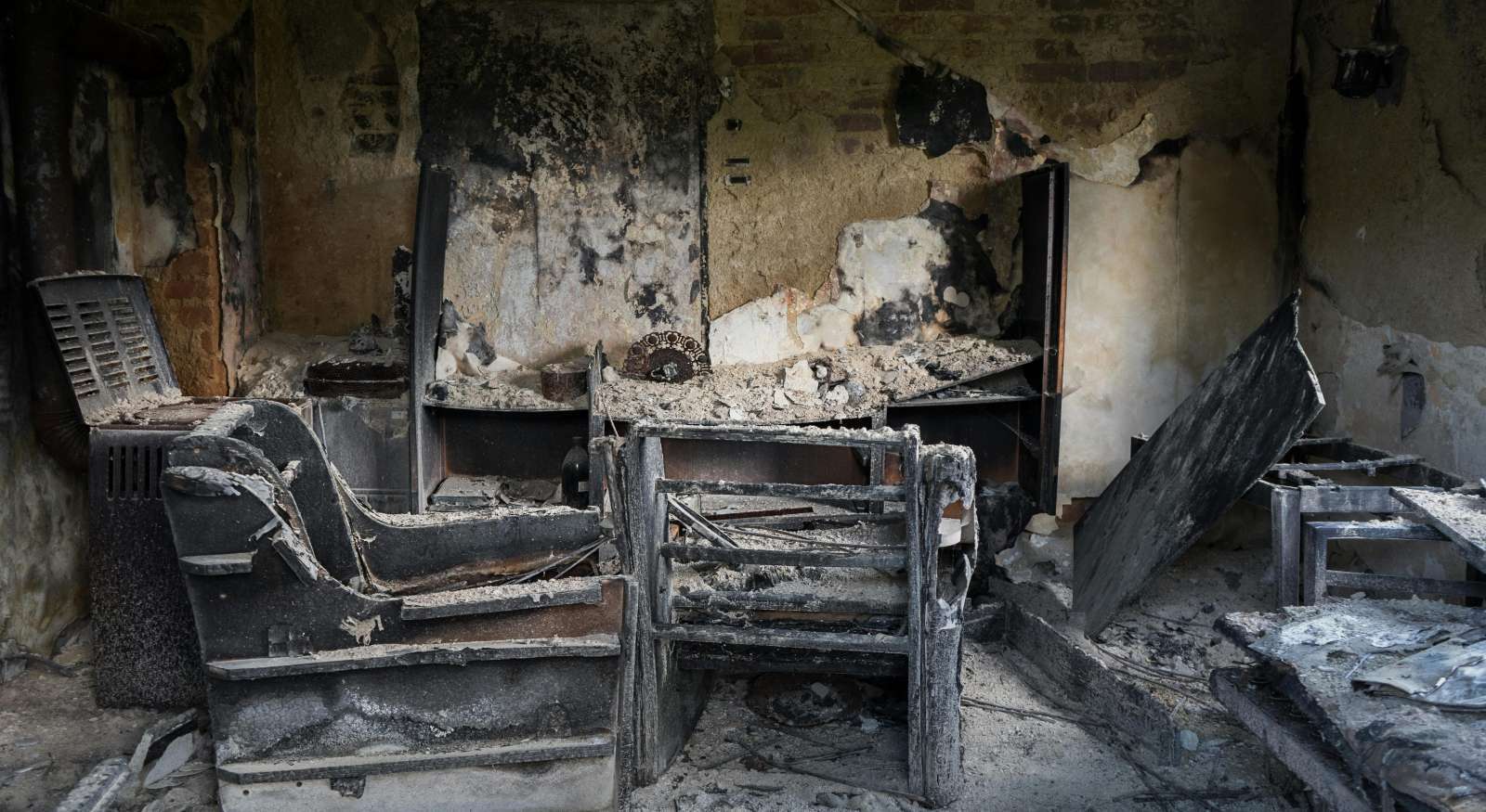 A living room with fire damage.