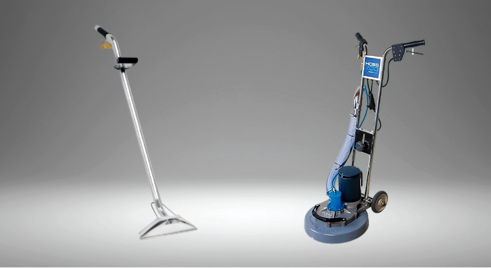 A carpet cleaning wand and a carpet rotary extraction machine.